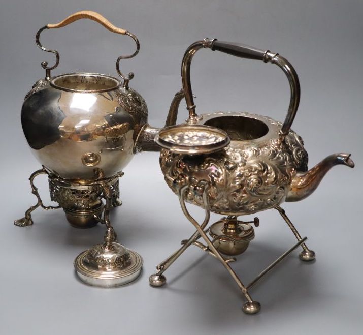 Two Victorian silver plated tea kettles each on burner stands, 34cm high